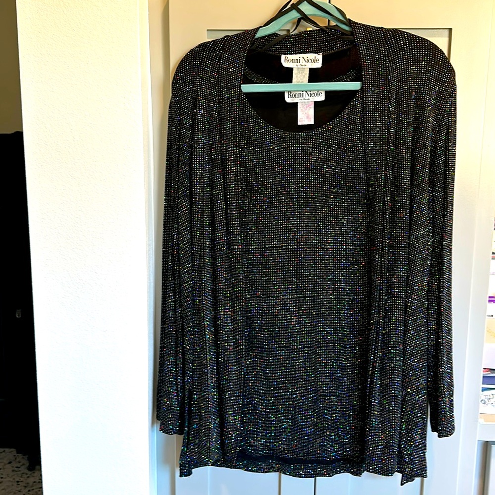 Black and metallic multi-colored shell & matching jacket travel wear.